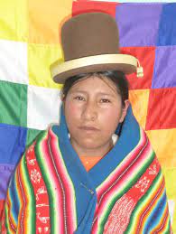 A Cholita Bolivian Indigenous Woman She Is Wearing Her Traditional Bowler Hat From The Dept Of La Paz Other De Types Of Hats Different Types Of Hats Hats