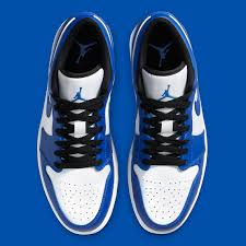 Featuring leather throughout, white lands on the panels, wings logo and tongue label while black covers the overlays, eyestays, swoosh, around the toe, tongue and laces. Air Jordan 1 Low Game Royal 553558 124 Sneakernews Com