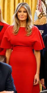 In A Red Valentino Dress At The Oval Office Of The White House In Washington D C On Feb 28 2017 Milania Trump Style Trump Fashion Celebrity Dresses