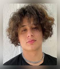 This child is lost. He doesn't find his parents. If someone recognizes him,  he can contact his parents.