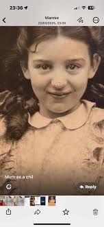 Can someone remove the scratch from the old photo?