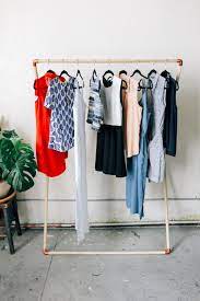 Hanging your clothes on a drying rack is a great way to save energy and ensure clothes stay in excellent condition. Leaning Garment Rack Diy The Joshua Tree House Garment Rack Diy Clothing Rack Diy Clothes Hangers
