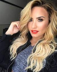 The color is definitely closer to a platinum blonde than the blonde she had before. Demi Lovato Goes Back To Her Natural Brunette Color In Record Time Instyle