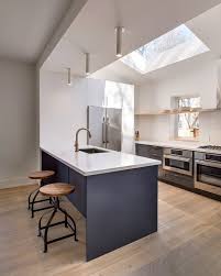 Installing a skylight is one of the most impactful ways to enhance the brightness. Modern Hilton House With Open Interiors And Skylights Digsdigs