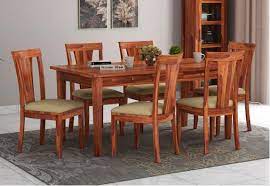 Wood dining room table sets are hefty and durable, however, ensure that your tabletop is sealed so moisture and liquid does not damage the precious wood. 6 Seater Dining Table Set Buy Dining Table Set 6 Seater Upto 70 Off