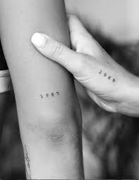 68 Small Meaningful Words And Quotes Tattoo Ideas To Look Unique Wrist Tattoos Words Small Words Tattoo One Word Tattoos