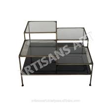 Not only does it bring the room together but where else are you going to set your remote down and not lose it? Modern Metal Glass Coffee Table Rustic Antique Brass Finished Metal Accent Cocktail Coffee Table With Glass Shelf Buy Brass And Glass Coffee Tables Glass Furniture Modern Glass Coffee Table Product On Alibaba Com
