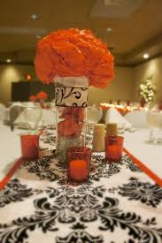 Burnt orange candles with teal velvet runner. Awesome Decorations Orange And Black Wedding Decorations
