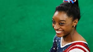 14 photos of Simone Biles doing her thing for the USA