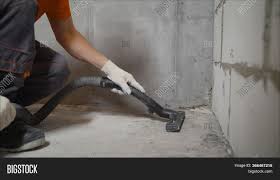 These nails are driven through a board and into concrete underneath, much like nailing a wood board to a wood floor. Worker Vacuums Image Photo Free Trial Bigstock