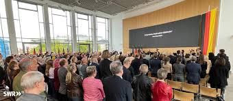 Unity Day: Ex-Minister Slams East-West Divide in Stuttgart Speech! - Imagen ilustrativa del artículo