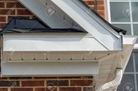 Vinyl siding tips & tricks whether you're an avid diyer or a certified pro, we have the knowledge you need to install vinyl siding the right way. Gable With Brick And Vinyl Siding White Frame Gutter Guard System Stock Photo Picture And Royalty Free Image Image 143775904