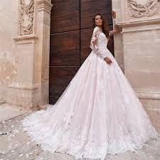 Gowns with long, fitted sleeves have been a favorite for centuries thanks to their versatility and elegance. Scoop Neck Long Sleeves Modest Wedding Dresses Lace Appliques Garden Amazing Women Bridal Gowns 2021 Princess