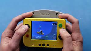 Open and unopened nintendo 64 game paks nintendo 64 games are rom cartridge based. Cool Portable Nintendo N64 Is About The Size Of A Retro Game Cartridge Slashgear