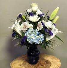 Maybe you would like to learn more about one of these? Sympathy Fifth Street Flower Shop