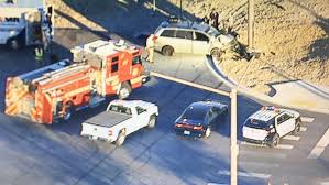 Impairment suspected after minivan crashes into light pole in west valley