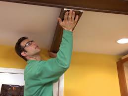 This board had to be solid because it would be supporting the entire beam. How To Install Faux Ceiling Beams How Tos Diy