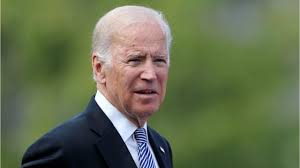 Biden, facing cash crunch, flips