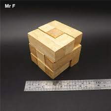 The solution involves facing the square faces to each other and twisting one upright to complete the four faced tetrahedronic pyramid. Wooden Intelligence Game 3d Wood Iq Puzzle Brain Teaser Tetris Cube 7 Piece In One Game Parts Game Motorolablock Game Aliexpress