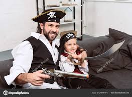 ··· father and son costume parent and son costume good halloween costume. Portrait Emotional Father Son Pirates Halloween Costumes Sitting Sofa Home Free Stock Photo C Micenin 211741874