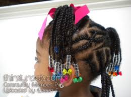 The perfect little girls natural hairstyles and hair updo for a unicorn birthday theme using jumbo hair to create a hair bun. Black Little Girls Hair Styles