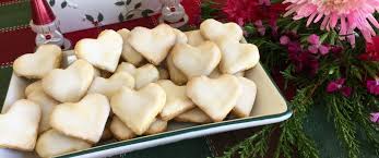 Spiced with cardamom, ginger and cinnamon then dipped in a tangy lemon glaze. German Lemon Heart Cookies Traditional Christmas Cookies