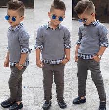Cute little boy in casual outfit on red background. Hair To Match The Young Boy Preppy Outfit Little Boy Haircuts Kids Outfits Boy Outfits