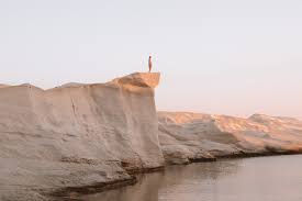 In between the white volcanic rocks lies a small sandy beach and many underwater caves for scuba diving. Moonscapes Of Sarakiniko Beach In Milos Greece Find Us Lost