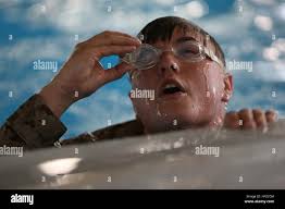 Adjusts goggles hi-res stock photography and images