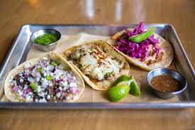 Whisk together the oil, lime juice, ancho, jalapeno, and cilantro and pour over the fish. Gonola Tops The Great Taco Tour