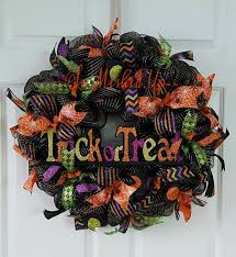 A tutorial on how to make an easy halloween or fall wreath using black. Halloween Wreath Deco Mesh Halloween Wreath Trick Or Treat Wreaths Fun Halloween Wreaths Halloween Decorations Party Decorations Halloween Mesh Wreaths Halloween Deco Mesh Halloween Wreath