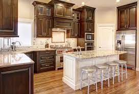 Dark Perimeter Cabinets With White Island Cabinets And Light Granite Throughout Kitch Brown Kitchen Cabinets Dark Brown Kitchen Cabinets White Kitchen Island