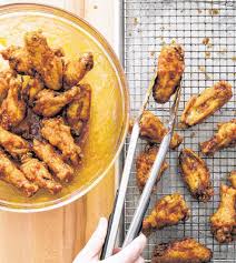 I don't know the reasons, but they sure go well together! Wings Big Appetite For Big Game Dish Pressreader