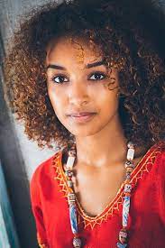 Beautiful Ethiopian Woman With Curly Hair In Traditional Clothing Curly Hair Women Most Beautiful Black Women Ethiopian Women