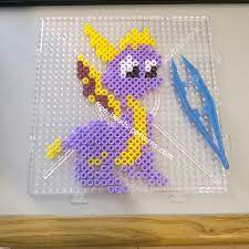 Perler Beads Pattern Dragon Bead Pattern Free These multicolor perler beads are a great arts and crafts activity for children. perler beads pattern dragon bead