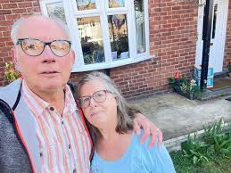 Hi all! I just wanted to introduce myself and share a photo that I took in  the area. This is John and I outside our house.