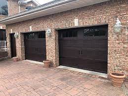 Steel garage doors, wood garage doors & aluminum garage doors in carriage house & traditional designs. We Re Still Working But Is Your Garage Door Rw Doors