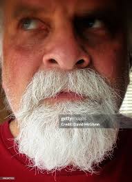 Man with bushy white goatee, late 50s News Photo