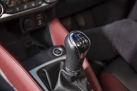 If you drive a manual transmission, place the car in neutral first by pressing the clutch pedal and using the gearshift to take the car out of gear. Should I Learn To Drive In A Manual Or An Automatic