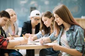 Happy student with thumbs up in a classroom. Student Images Free Vectors Stock Photos Psd