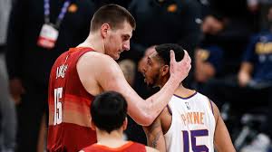 The nuggets fan threw a punch at the suns fan and the suns fan grabbed. Jqpm9jwxg7vs M