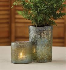 Since the mouth of my vases are wide enough to sneak in a pillar candle, i turned them into hurricanes. Aged Mercury Glass Hurricane Candle Holder Split P