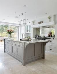 Designed as a workhorse, it provides oodles of counter space for prepping, cooking and eating. What Do You Think Of This Open Kitchen Design Coastal Virginia Magazine S Best Kitchen B In 2020 Contemporary Grey Kitchen Grey Kitchen Designs Grey Kitchen Island