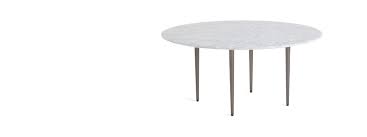 A round coffee table comes in many styles in this west elm collection, including sturdy wood. West Elm Work Horizon Round Coffee Table Steelcase