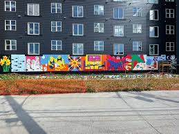 MIAD students, alumni complete Taxco Apartments mural - Milwaukee Institute  of Art and Design