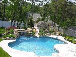 All pool slides come with fiberglass and polyester resin slide surface. Pool Slides For More Summer Fun Poolbargains Blog Swimming Pool Designs Swimming Pools Backyard Swimming Pool Slides