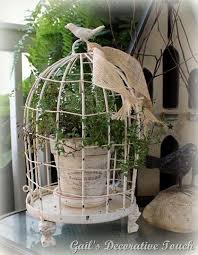 • leaving plants in their pots, arrange decoratively. Birdcage Redo Crafts Bird Cage Decor French Country Decorating Bird Cages