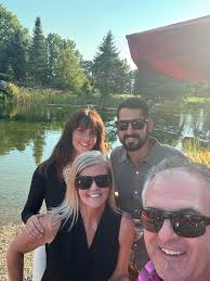 Foreground: Bryan and Wendy Marriotti (Megan George's mother). Background:  Keane, great grandson of Sha'nini George, and Megan George.