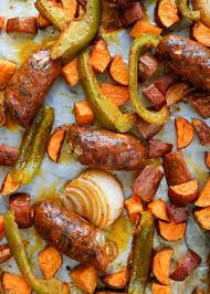 Sheet Pan Roasted Sausage With Sweet Potatoes And Peppers Get This Easy Dinner Recipe At Barefeetinthekitch Stuffed Peppers Sheet Pan Dinners Recipes Recipes