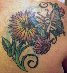 Butterfly tattoo ribbon supporting breast cancer research is a common tattoo meaning for girls. Pink Ink Flower Butterfly Tattoo With A Pink Ribbon Twist My Pink Ink